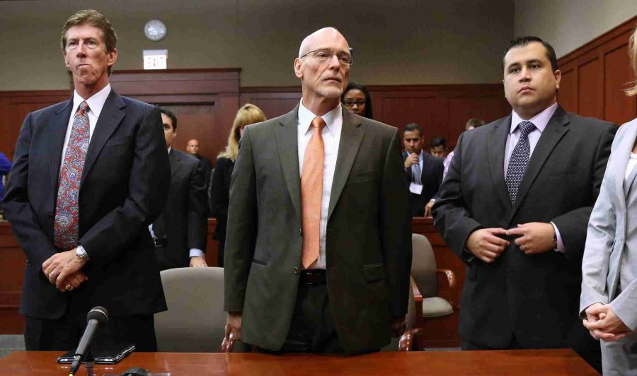 George Zimmerman (far right) and his legal council were  in the courtroom for less than five minutes this morning.