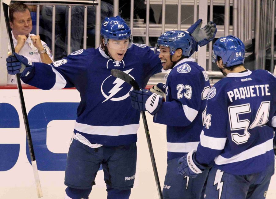 Adam Erne, left, celebrates his second goal of the game against the St. Louis Blues.
