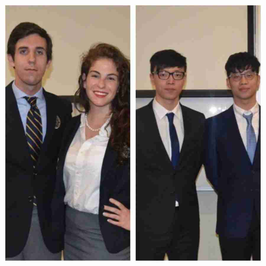 Student from Rollins College (left) and China (right) debated the Syrian conflict. 