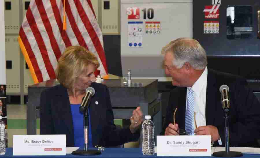 Betsy Devos and Sandy Shugart had a cheerful exchange before the Advanced Manufacturing round table discussion began.