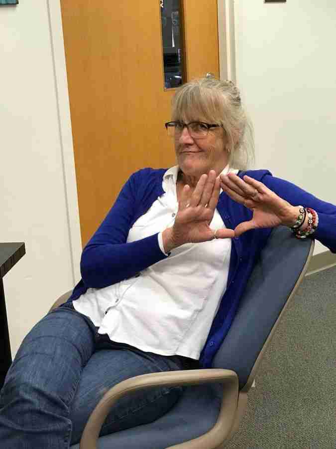 Debbie Drobney, the main coordinator of the Sign Language Interpretation Program at Valencia College East Campus signs the word vagina.