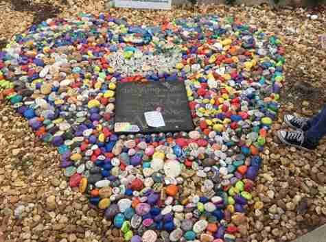 Rock sculpture honors the memories of the #49 who lost their lives one year ago.