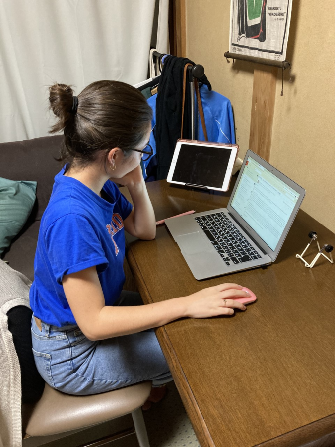 Minami Matsuzaki studying on her computer in Tokyo, Japan. 