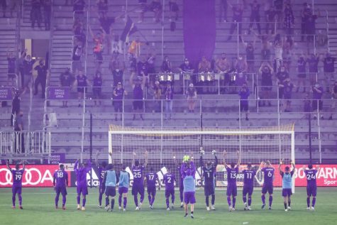 Orlando City players and fans exchanging waves pre game vs the Chicago Fire. 