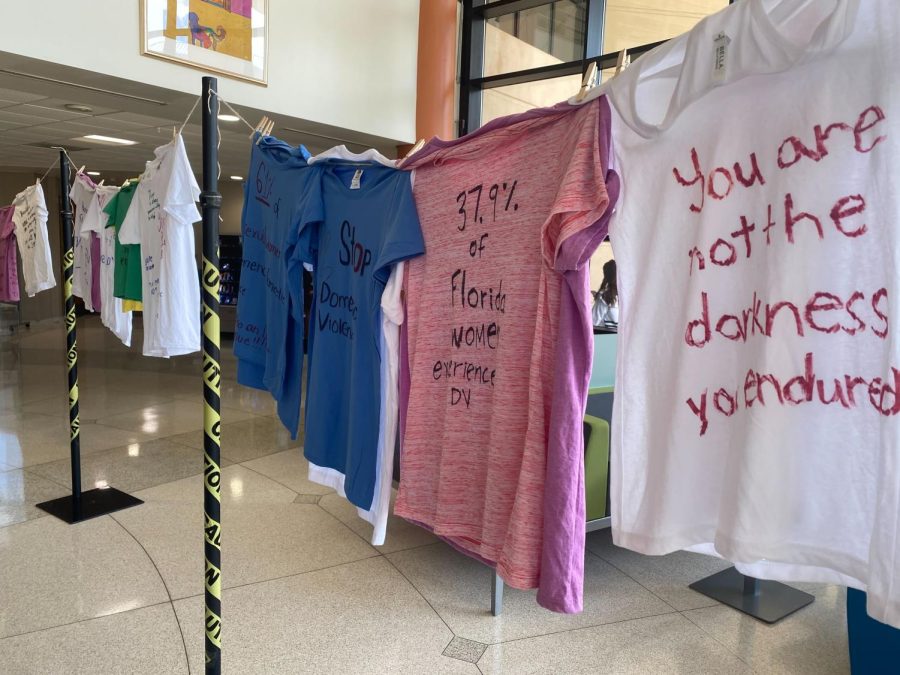 Shirts hanging in a display at Valencia Colleges East Campus contained statistics, quotes and words of encouragement for survivors of domestic violence. The project is a partnership with Orlando non-profit Stand Up for Survivors @standupsurvivor on Instagram. 