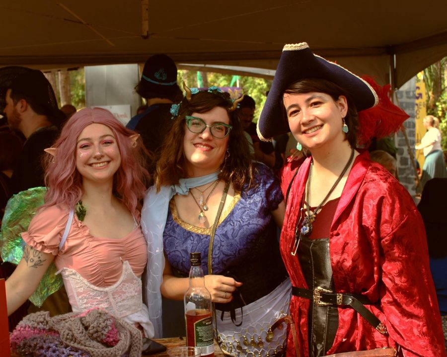 Faire attendees enjoying one of the few pubs  where one can enjoy some mead and ale.