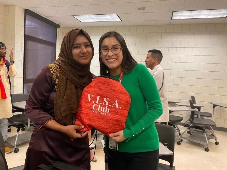 (Pictured from left to right) V.I.S.A. Club movie night organizer Tehsina Haq and ISS Recruitment Specialist Daniela Garcia-Laverde. 
