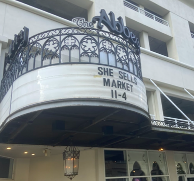 A frontage sign recognizes March's She Sells. Market event. The women-owned business collective hosts once-a-month markets at Orlando's The Abbey. 