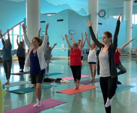  The Disney Cruise Line cast members enjoy a free yoga session as part of their wellness program.  