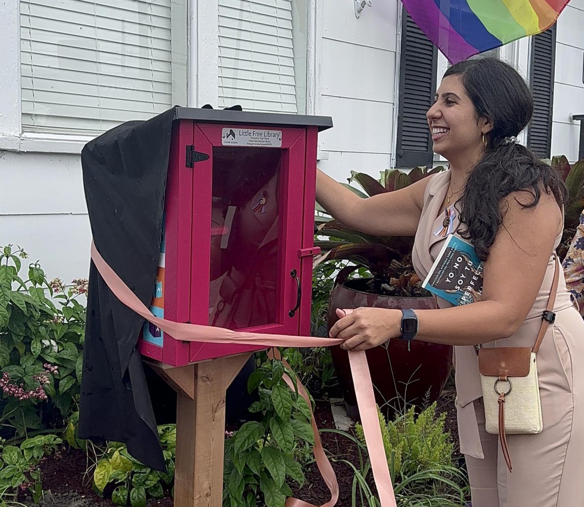 Representative District 42 Anna Eskamani unveils the new Little Free Library The Julius July Perry. outside of the Zebra Youth location, 911 N. Mills Ave. 
