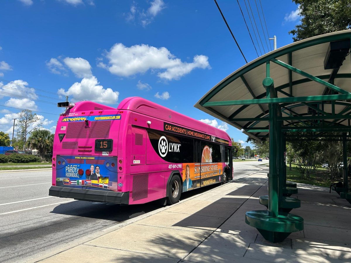 Lynx Bus 15 arrives at the East Campus bus stop.  