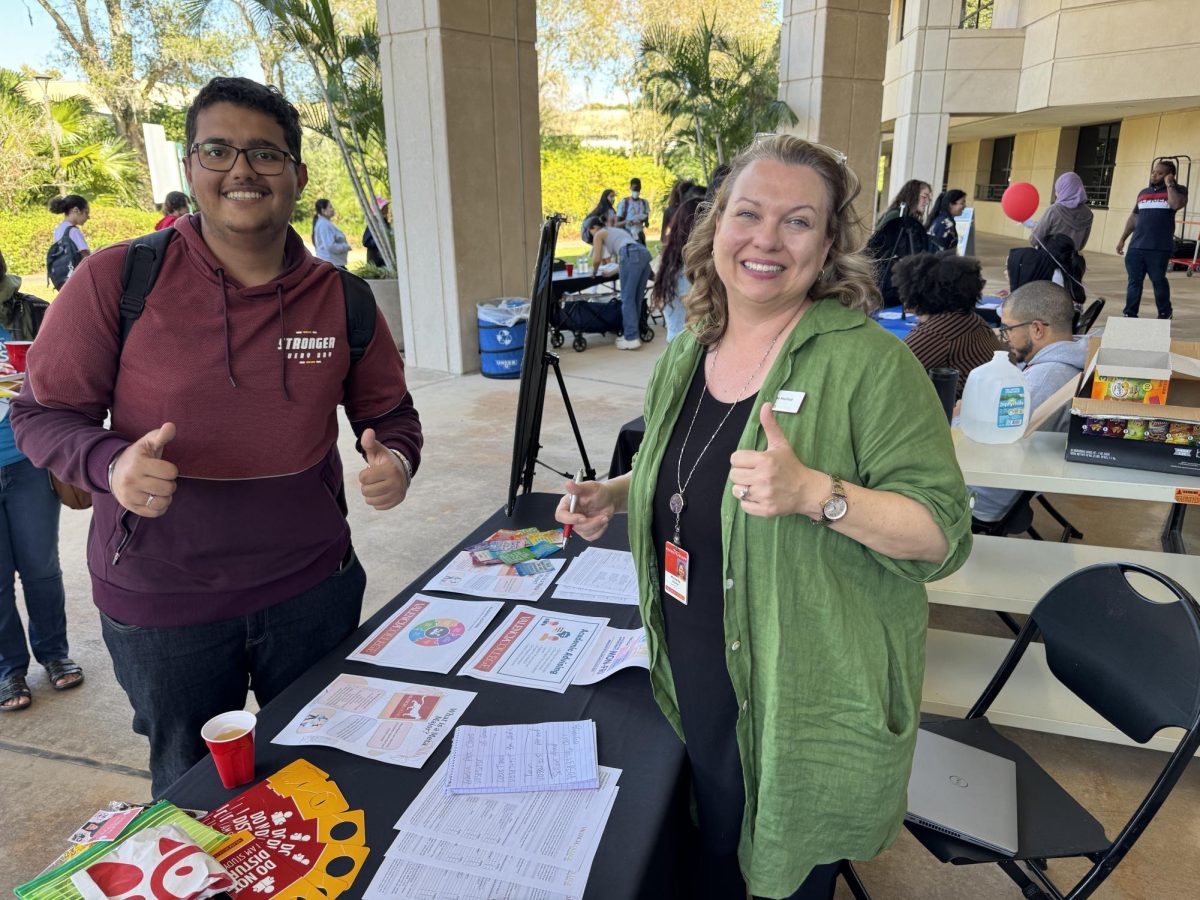 Sallam Ahmed, 17, Civil Engineering, (left) attends Valencia College Career Center First Generation Day Celebration. Ahmed enrolled after applying unsuccessfully to UCF. The smaller classes and resources help Ahmed with his goals to DirectConnect to UCF after his course completions. 
