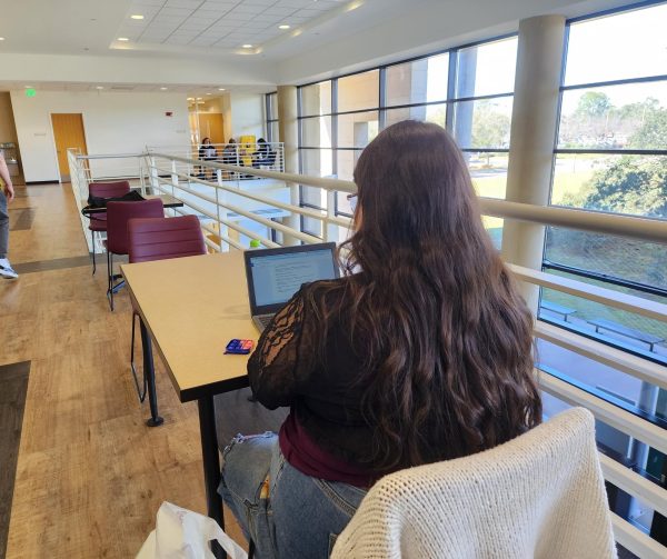 Student Josephine Epifanio works on an assignment in Bldg 8 on Valencia Colleges East Campus. 