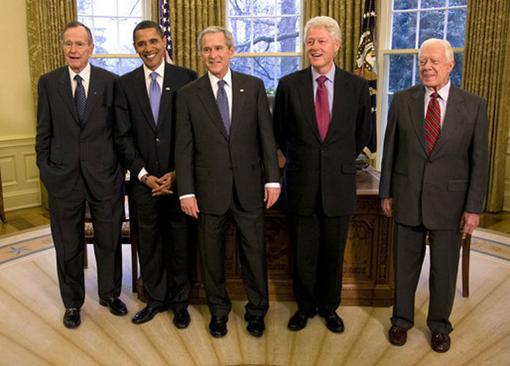 2009 Five Presidents, President George W. Bush, President Elect Barack Obama, Former Presidents George H W Bush, Bill Clinton & Jimmy Carter, Standing by Beverly & Pack is marked with Public Domain Mark 1.0.