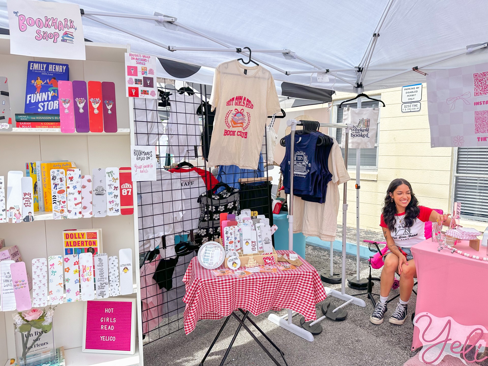 Pictured: YeliCo and Armor of God owner Aiyelis Otero sells pop-culture bookmarks and stickers. Otero vendored at the June 2 “Camp Hot Girl”.