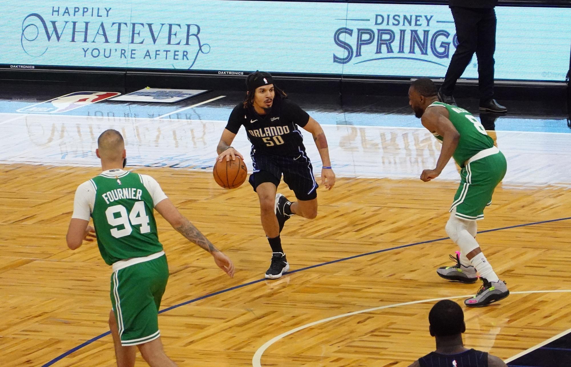 Magic point guard Cole Anthony going for the lay-up against the Boston Celtics (photo from Flickr).