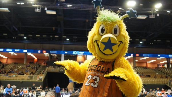 Osceola Magic mascot, Swish, fires up the crowd before the game.